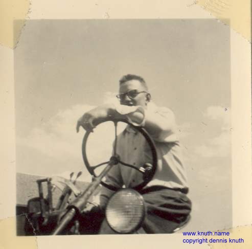 John Knuth on a farm tractor